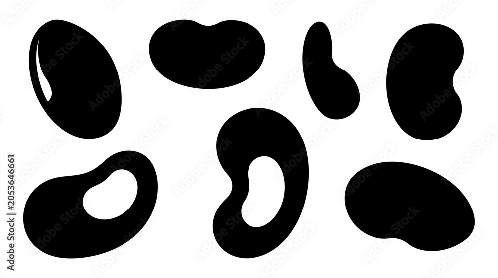 Fototapeta premium A set of black kidney bean shapes on a white background for design or illustration