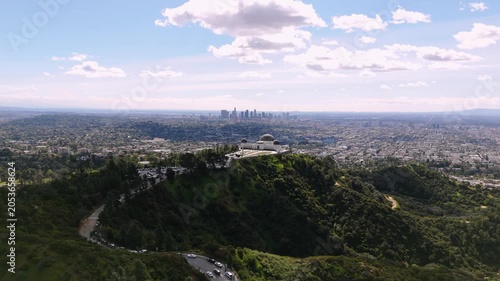 Griffith Observatory aerial panorama with Los Angeles downtown skyline and Hollywood Hills