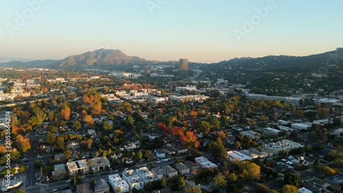 Aerial Drone Flight Over Residential Neighborhoods and Mountains in Los Angeles California at Golden Hour