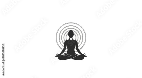 Fotografie A silhouette of a person sitting in a meditative pose with circular energy rings