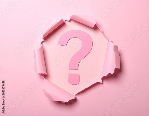 Pink question mark revealed through torn pink paper