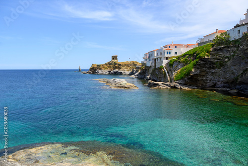 Andros Castle and Tourlitis Lighthouse of Chora. Andros island, Cyclades, Greece