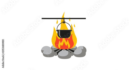Fotografie A metal cooking pot hangs over a bright campfire surrounded by grey stones