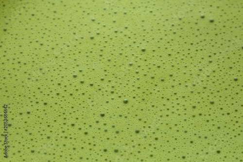 Macro Close-Up of Freshly Whisked Matcha with Velvety Foam and Smooth Texture