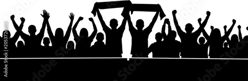 Photos A group of people cheering and holding up a sign in silhouette