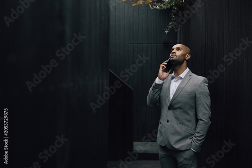Man in Suit Maintaining Eye Contact in Discussion