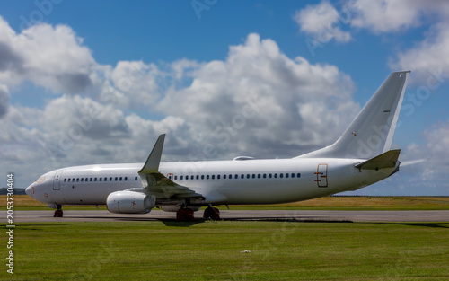 White tail airliner. Windows and doors sealed against the elements., awaiting a new operator or possibly the scrap heap.In storage.