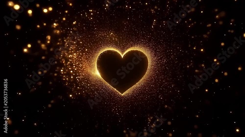 Glowing golden silhouette heart shape surrounded by magical shimmering particles and bokeh on black background. Luxury romance and wedding celebration concept