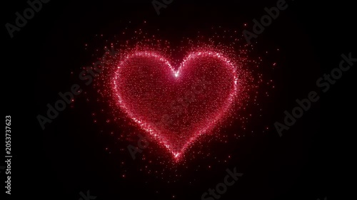 Glowing red particle heart shimmering and emitting sparkles against solid black dark background. Romantic Valentines day concept