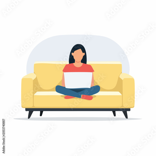 Woman sitting on a yellow couch using a laptop