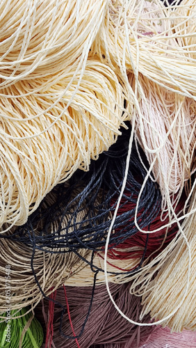 Fotografie Types of yarn include: Cotton Yarn, Wool Yarn, Silk Yarn, Linen Yarn, Bamboo Yar