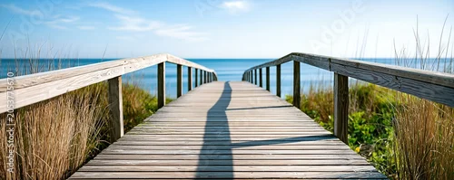 Panel kuchenny z motywem Coastal Boardwalk Leading To Ocean Horizon, Serene Beach Landscape With Wooden Path And Blue Sky