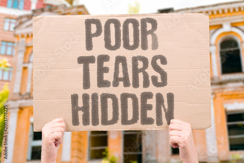 Billede på lærred "Poor tears hidden" Crying due to poverty concealed