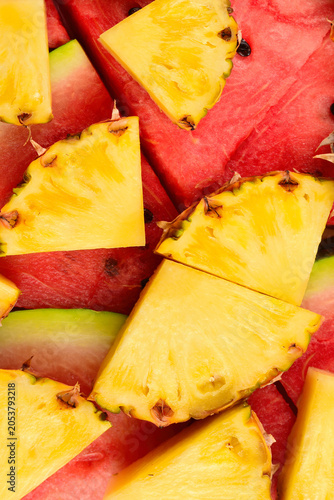 Pineapple and watermelon slices background.