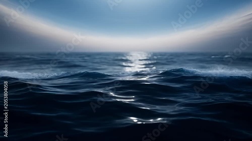 Ocean surface with sunlight reflection and abstract water motion