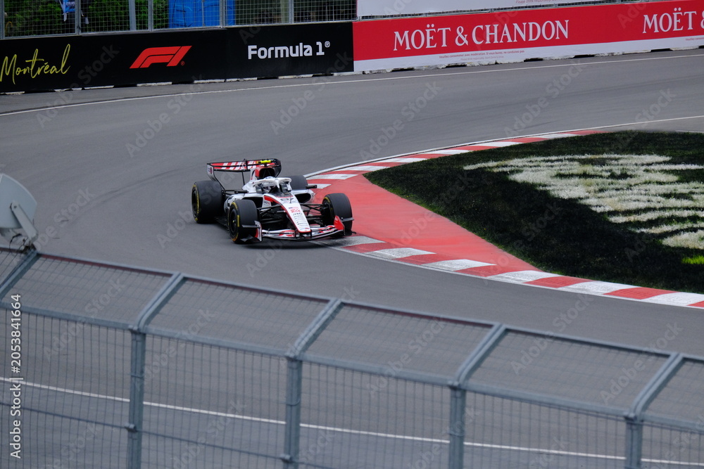 Obraz premium May 24, 2026, Montreal, Canada - Haas Formula 1 car on track by Ocon and Bearman at Circuit Gilles Villeneuve. g.