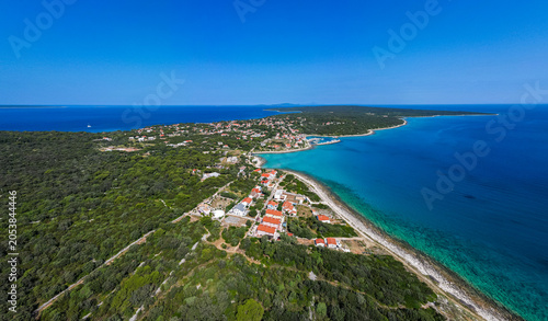 Canvas-taulu Aerial drone panorama of the western part of Silba Island, Croatia, surrounded by the crystal-clear Adriatic Sea