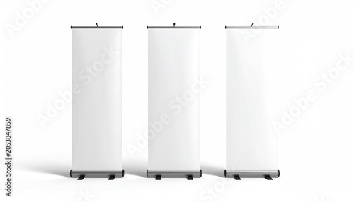 Three blank, roll-up banners stand side-by-side on a clean, bright, white background