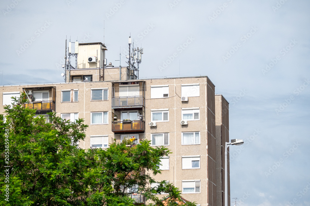 Fototapeta premium Telecommunication Antennas On Apartment Rooftop