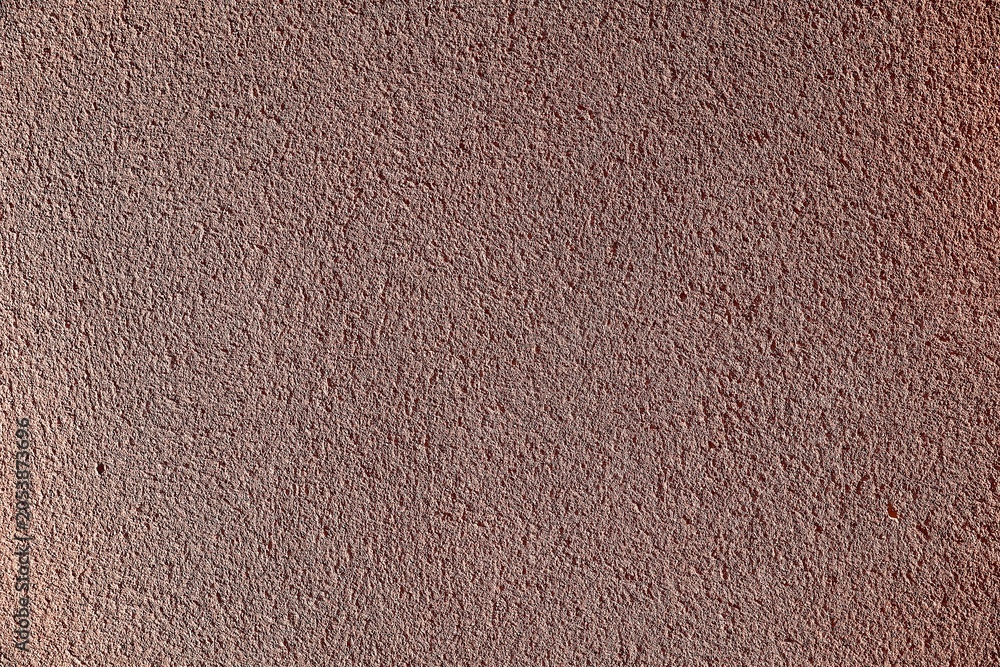 Fototapeta premium Rough beige stucco wall texture. 