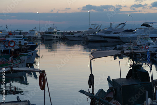 fishing boats at sunset