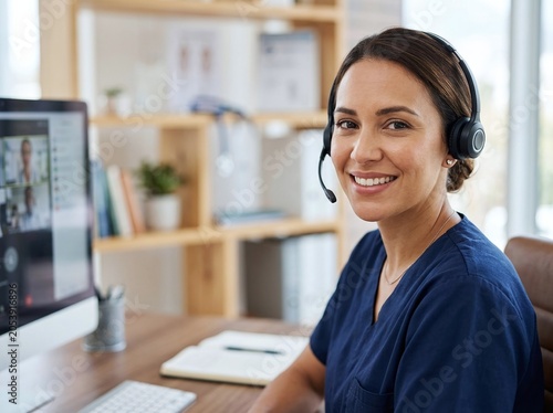 Female Healthcare Professional Wearing Headset During Virtual Consultation
