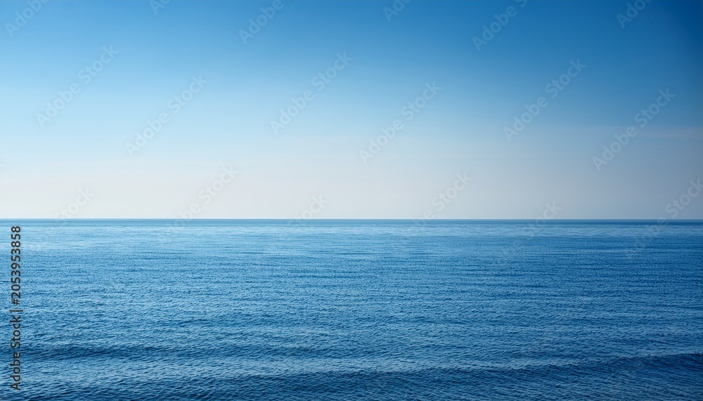 Fototapeta premium A Vast Uninterrupted Seascape Where The Calm Ocean Meets The Pale Cloudless Sky Along A Perfectly Defined Empty Horizon Line Blank Water Ethereal
