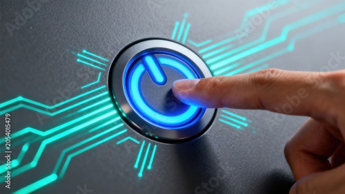 Human finger activating illuminated digital power button representing startup technology system control and modern electronic interface concept