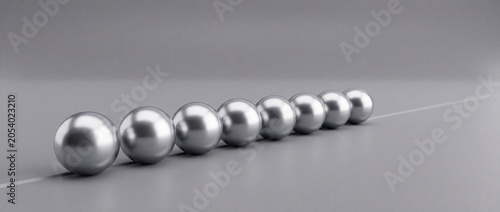 Schilderij op canvas Perfectly aligned metallic spheres in a row, minimalist scene, abstract composit