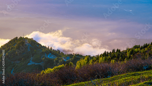 Obraz na plátně Breathtaking sunset view over the mountain ridge and valley
