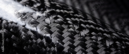 Cuadro en lienzo Close up texture of woven black carbon fiber material showing intricate interlac