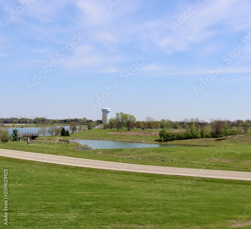 The peaceful pond in the country on a sunny day.