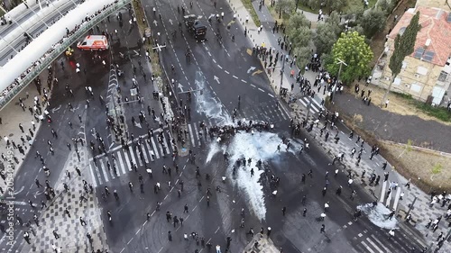Aerial view Ultra Orthodox Protest Against Military Draft Jerusalem

Drone footage of ultra Orthodox protest near Chords Bridge, Cannon Dispersing Draft Protest Jerusalem, Israel, 1 June 2026.

