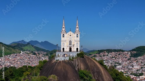 Aerial View of Basilica Sanctuary of Our Lady of Penha Built on a Rock With Views of the Neighborhood Behind in Rio de Janeiro City