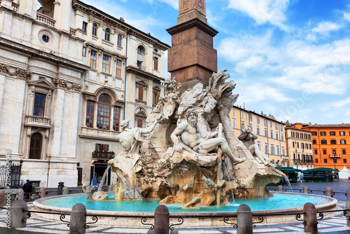 The famous Fountain of the Four Rivers at Piazza Navona in Rome, Italy. Historic Baroque architecture, sculptures and one of the most visited landmarks in Europe.