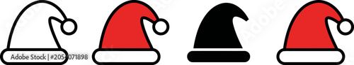 Foto Four different colored Santa Claus hats with white trim and pom poms