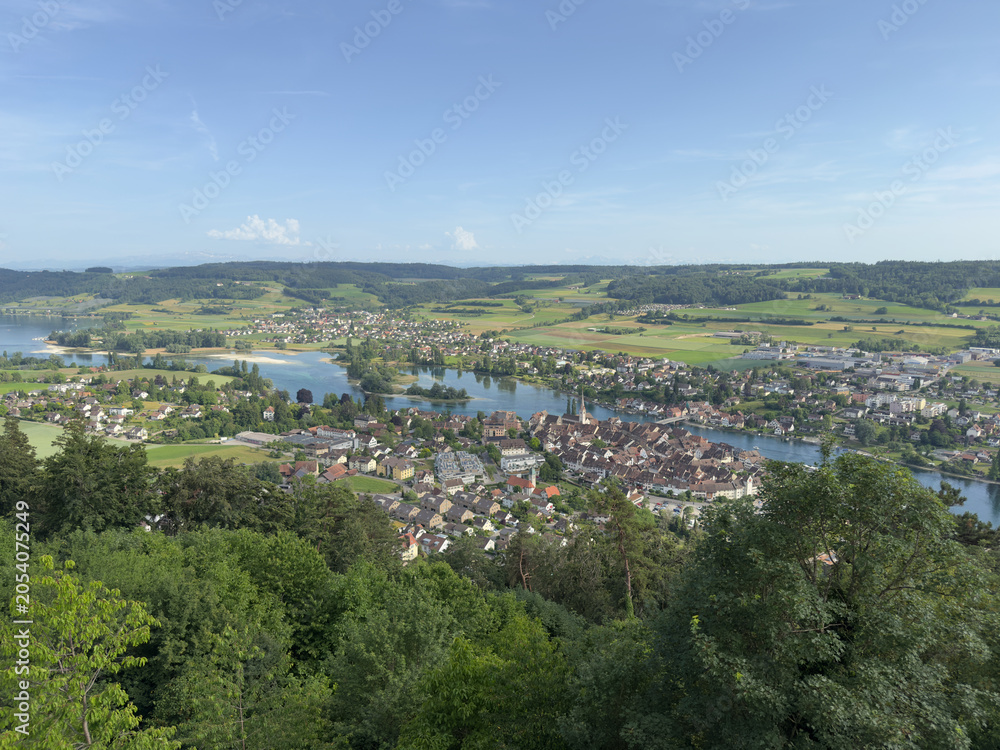 Fototapeta premium Aerial View of a Historic Town and River in Switzerland