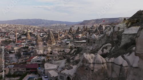 Drone view of Göreme, a historic town in Cappadocia famous for its fairy chimneys, cave houses and unique volcanic landscape.