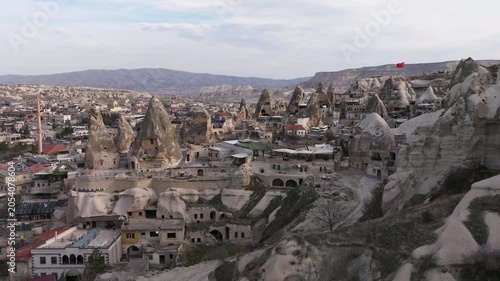Drone view of Göreme, a historic town in Cappadocia famous for its fairy chimneys, cave houses and unique volcanic landscape.
