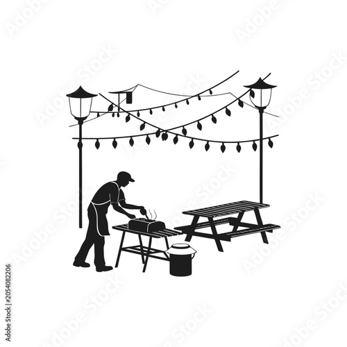 Worker installing outdoor string lights on patio furniture setup in backyard