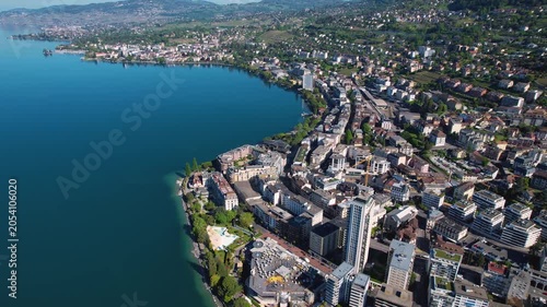 An aerial view beside the city and old town of Montreux in Switzerland beside lake Geneva on a sunny noon in spring.