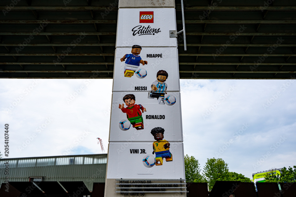 Naklejka premium LEGO Editions football player display under highway overpass. Toronto, Canada - June 9, 2026.