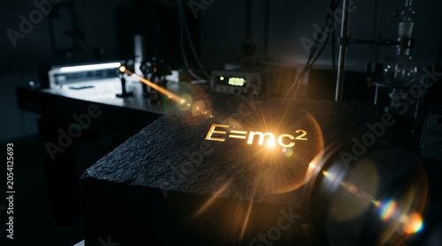 E mc2 equation on blackboard with laser light