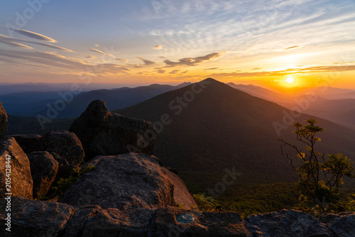 Sunrise Over Flat Top Mountain Seen From Sharp Top in The Blue Ridge Peaks of Otter Virginia With a Stone Wall in Foreground