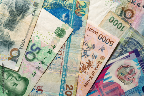 Assorted Asian and international banknotes close-up