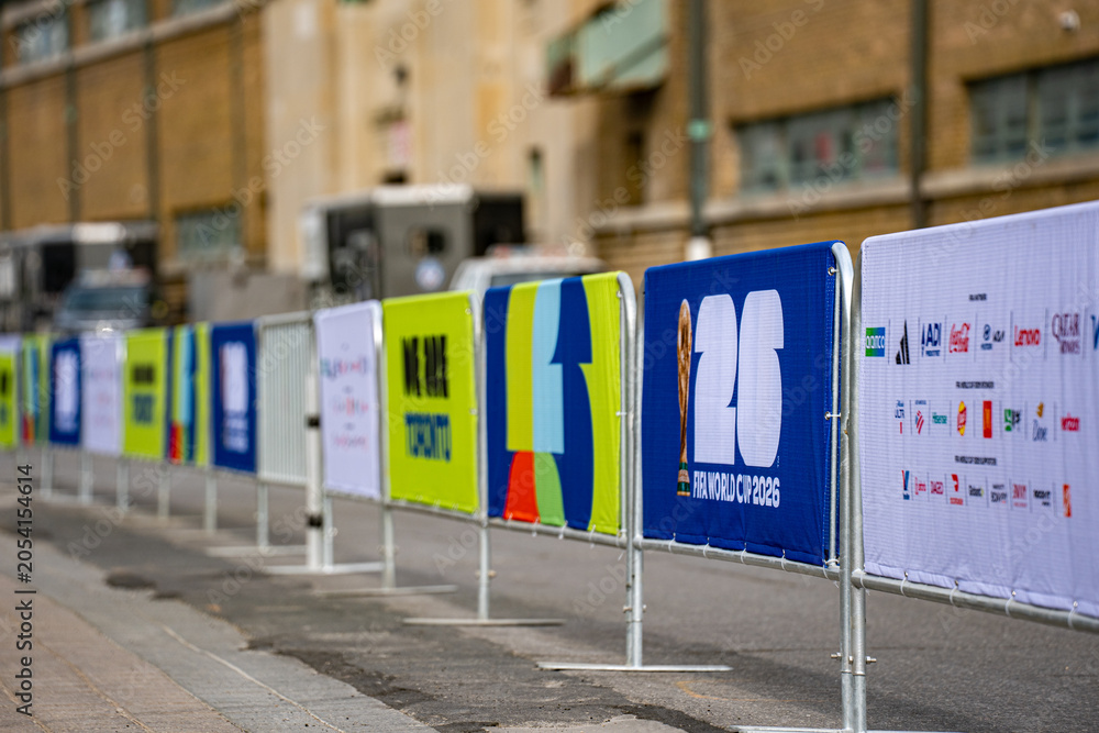 Naklejka premium FIFA World Cup 2026 event barriers on city street. Toronto, Canada - June 9, 2026.