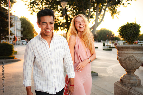 Photography Evening stroll of friends enjoying their time together in the city