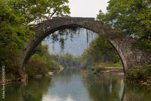 Картината върху платно Scenic view of Fuli Bridge, a historic stone arch bridge built more than 500 yea