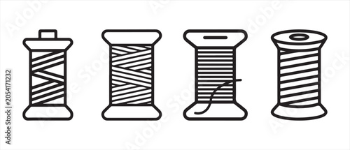 Fotografie Set of four different sewing thread spools in simple black line art style