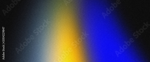 Dark abstract background featuring a bright yellow and blue color gradient with a soft grainy texture overlay.